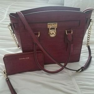 Mk embossed leather satchel and extra large wallet